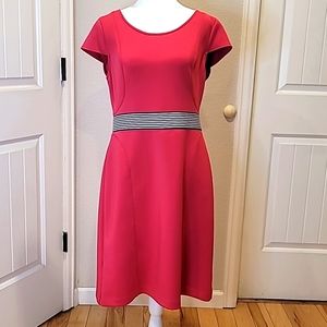Hot pink dress size 10 with sewn in black and white belt